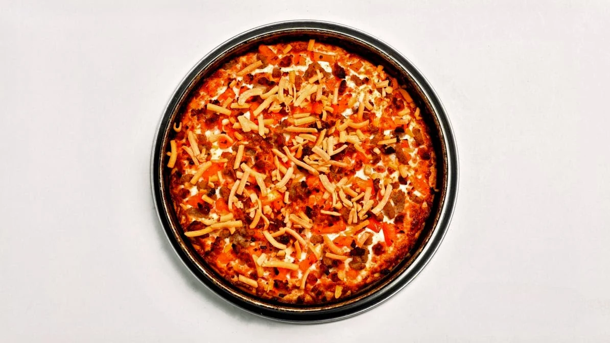 Butter Chicken Pizza - Indian fusion pizza at Pizza 64 Saddlepeace, Calgary